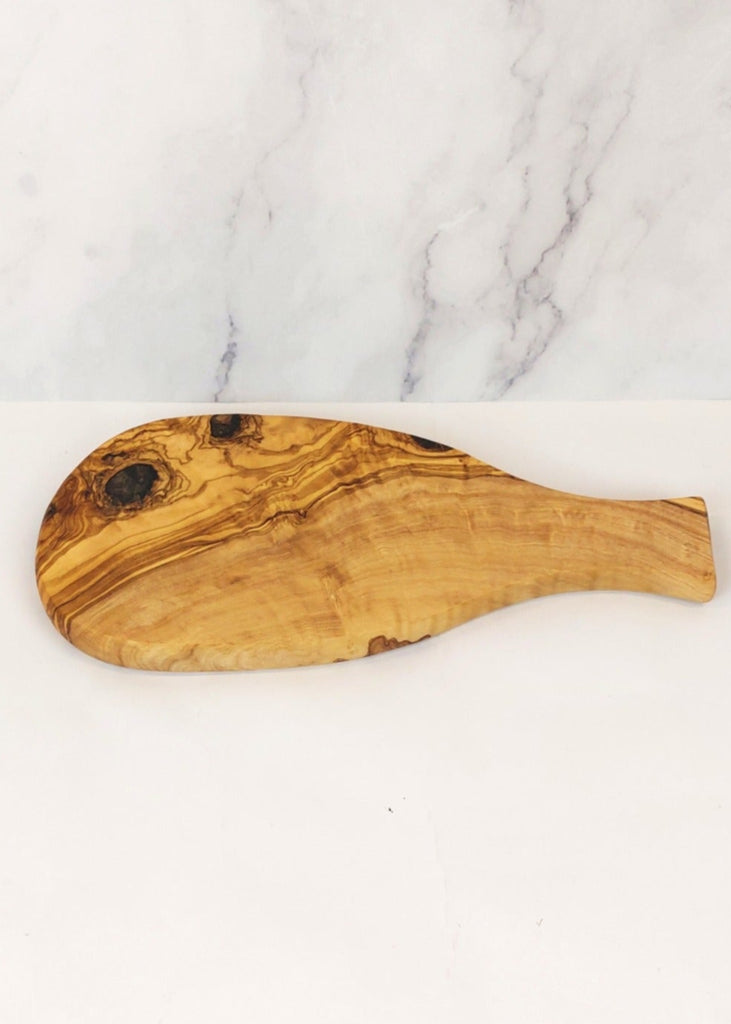 A small non-rustic olive wood cheese boards with a smooth, polished surface